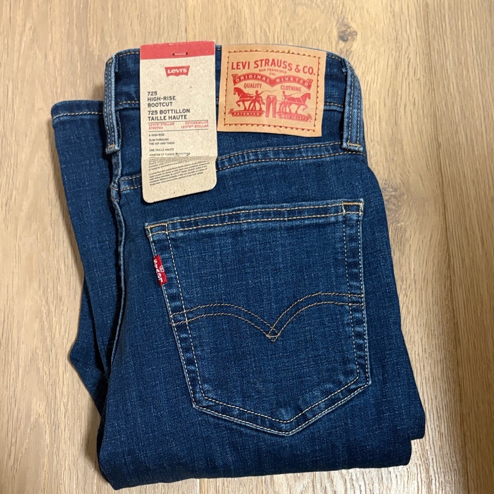 Levi's Dark Blue High-Rise Bootcut Jeans size 27/32 Brand new. Same day ship